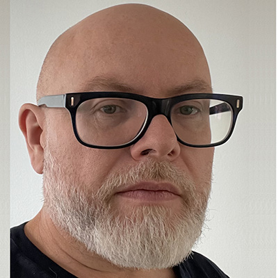 Author photo of middle-aged Caucasian male in glasses