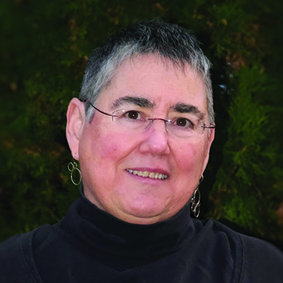 Author photo of Mary FIssell, glasses wearing middle-aged Caucasian woman