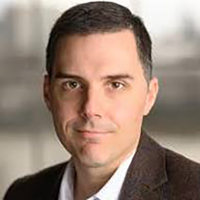 A profile pic of Mark Condos staring straight into the camera.